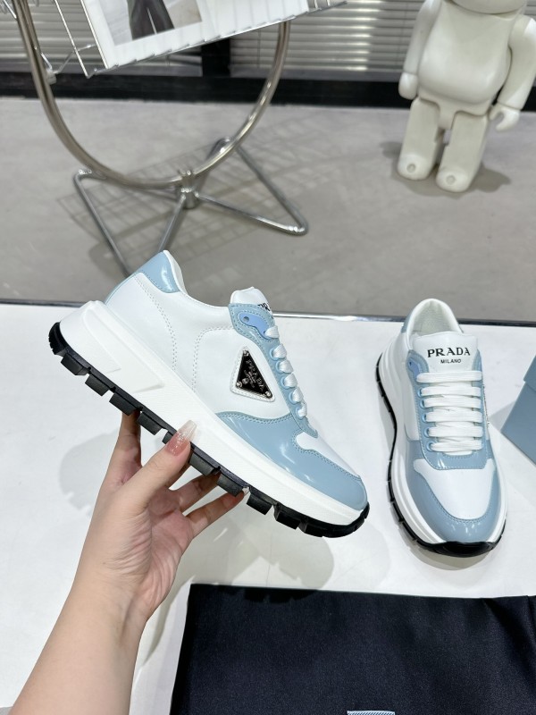 2025 Women Prada Light Blue White Leather Sneakers KFY00310