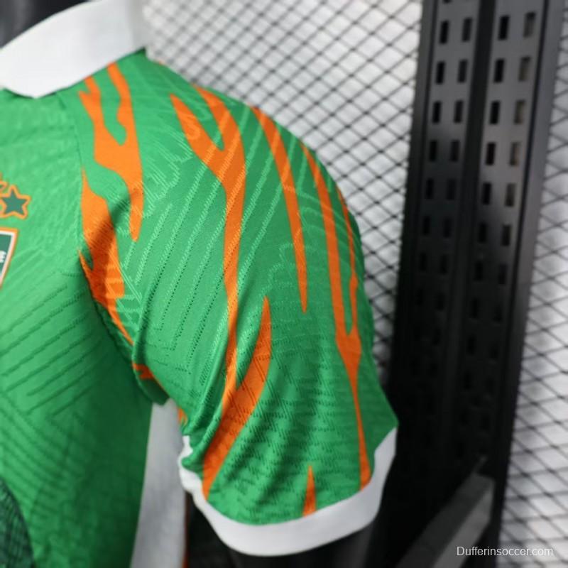 Player Version 2025 Ivory Coast Green with Elephant Graphic and Orange Trim Jersey